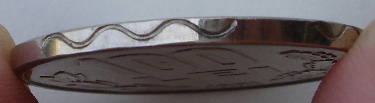 100 lei 1991 - muchie linie sinuasa...jpg